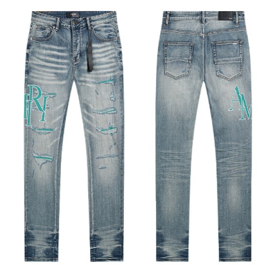 Light Blue Washed Denim Jeans with Teal AMIRI Logo and Distressing